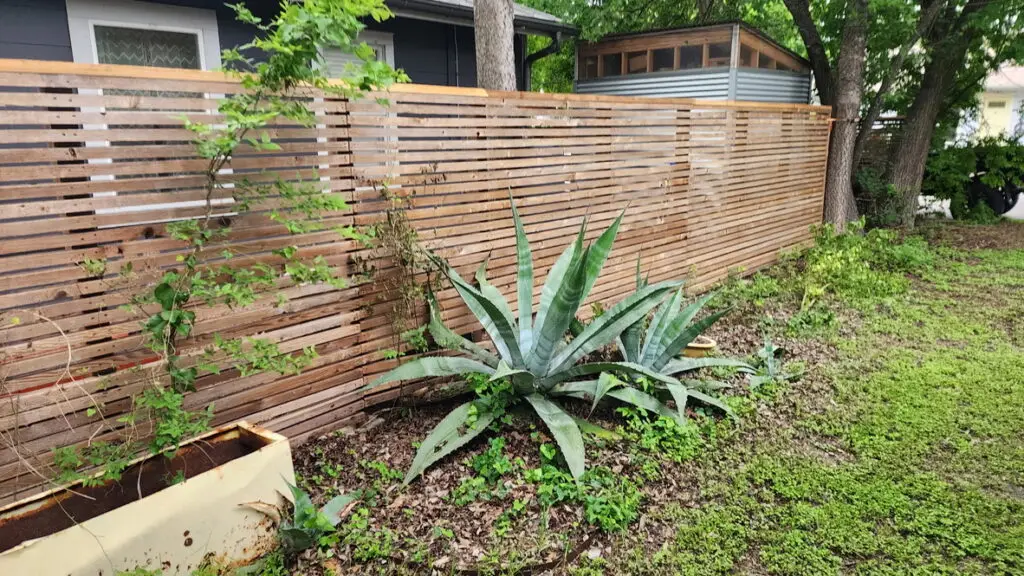 Fence Repair and Restoration in Austin — leaning post reset